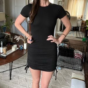 Black mini dress with ruching
